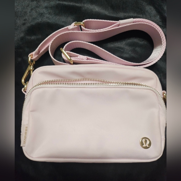 lululemon athletica Handbags - lululemon athletica Light Pink Crossbody Bag with Gold Hardware